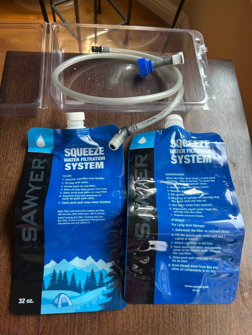 New Sawyer Squeeze Water Filtration System designed for hiking camping